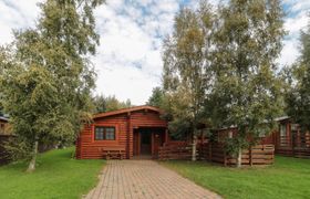 Photo of welcome-hjem-log-cabin