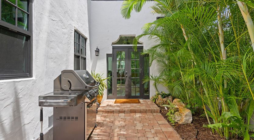 Photo of Blue Water & Palm Trees