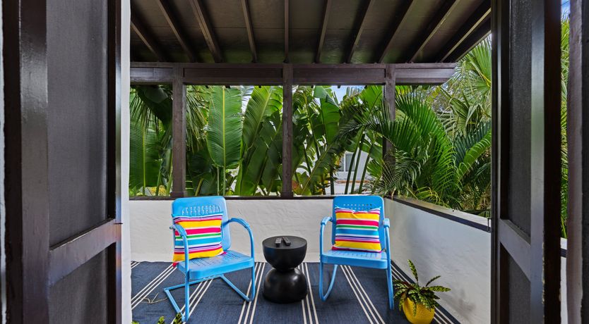 Photo of Blue Water & Palm Trees