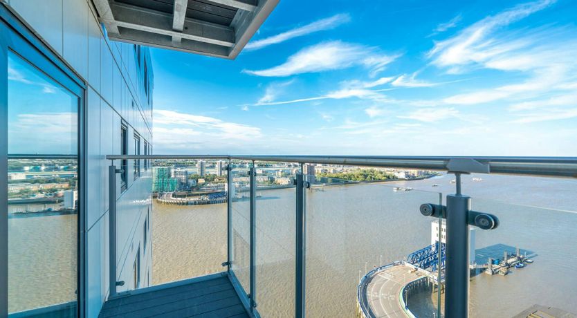 Photo of Reflections by the River