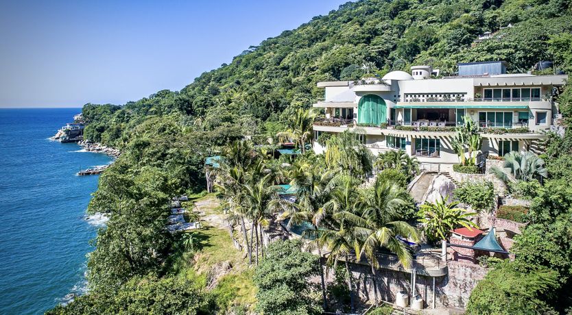 Photo of Waterfalls and Palm Trees