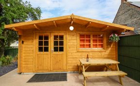 Photo of Log Cabin - Amber Glow