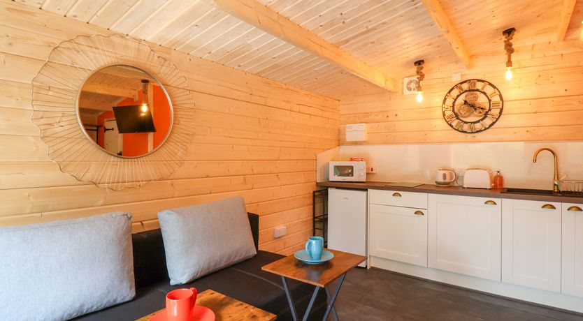 Photo of Log Cabin - Amber Glow