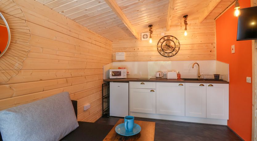 Photo of Log Cabin - Amber Glow