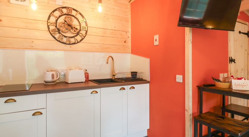 Photo of Log Cabin - Amber Glow