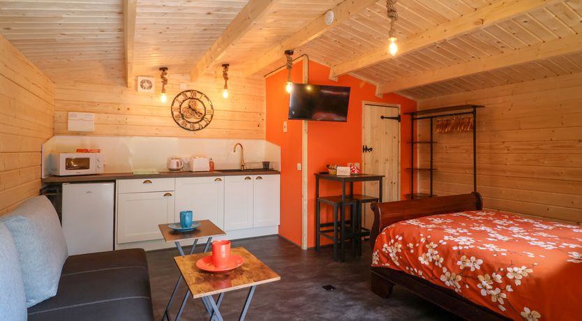 Photo of Log Cabin - Amber Glow