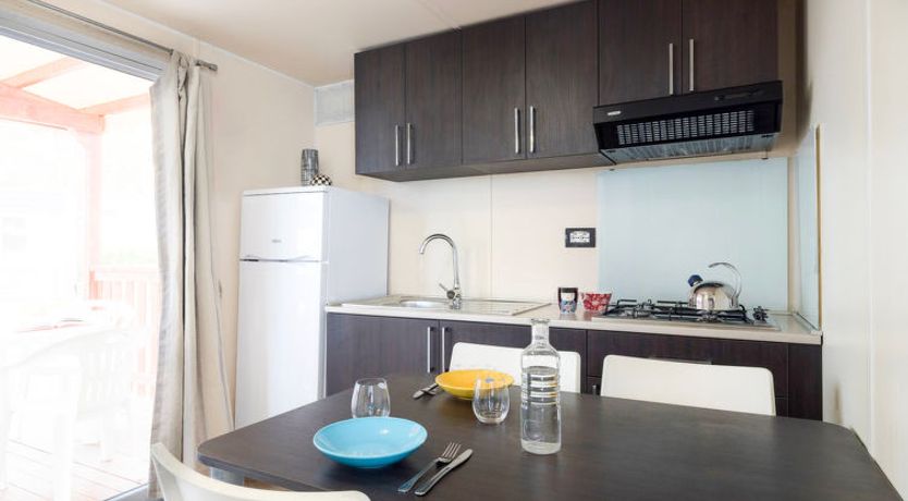 Photo of Camping Village Roma Capitol Villa 4