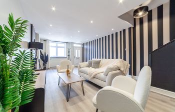 Black, White & Teal Holiday Home