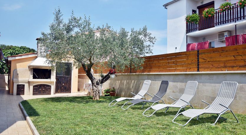 Photo of Apartment Denis with Terrace & Lovely Garden 