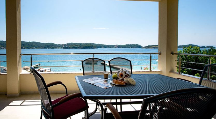Photo of Villa Gulli - Apartment Gold with Private Beach