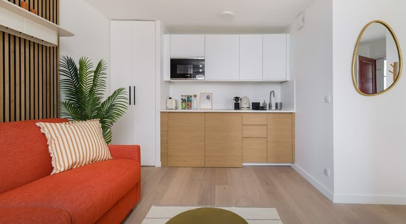 Photo of Au pied de la Tour Eiffel