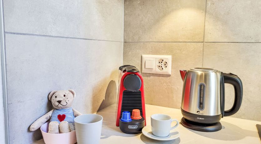 Photo of White Locarno Apt.1