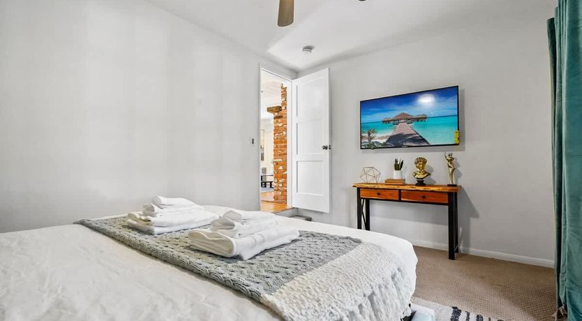 Photo of In the Shadows of Palms