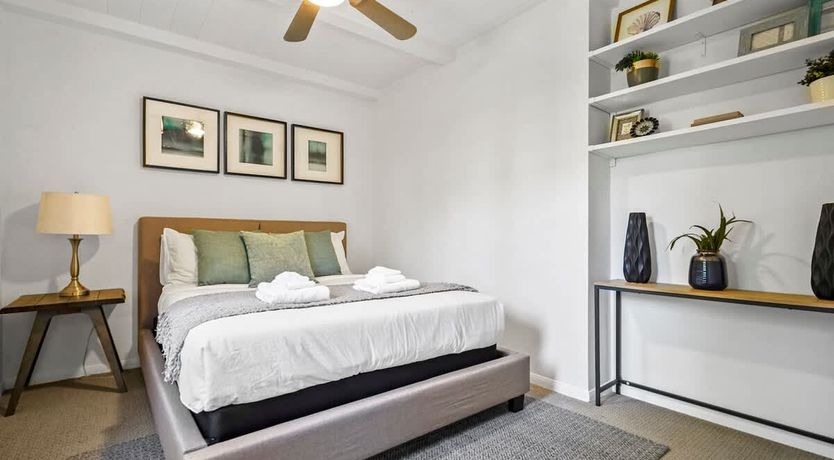 Photo of In the Shadows of Palms