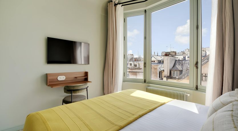 Photo of Over the Parisian Rooftops