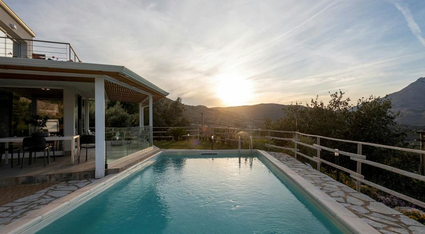 Photo of Serene Sea & Mountain Vistas