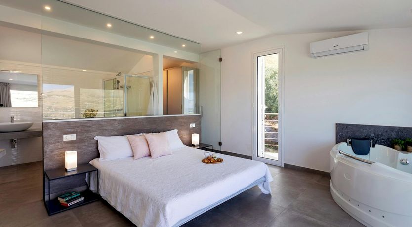 Photo of Serene Sea & Mountain Vistas