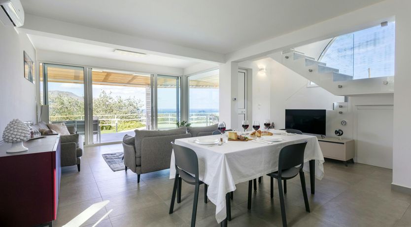 Photo of Serene Sea & Mountain Vistas