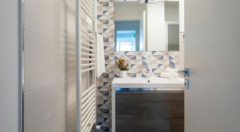 Photo of Serene Sea & Mountain Vistas