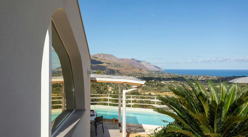 Photo of Serene Sea & Mountain Vistas