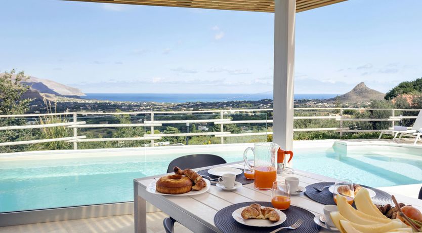 Photo of Serene Sea & Mountain Vistas