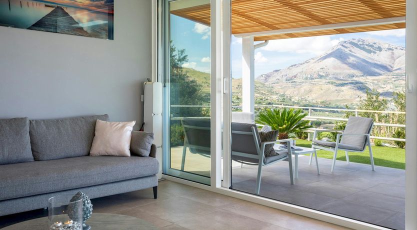 Photo of Serene Sea & Mountain Vistas