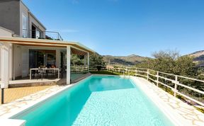 Photo of Serene Sea & Mountain Vistas