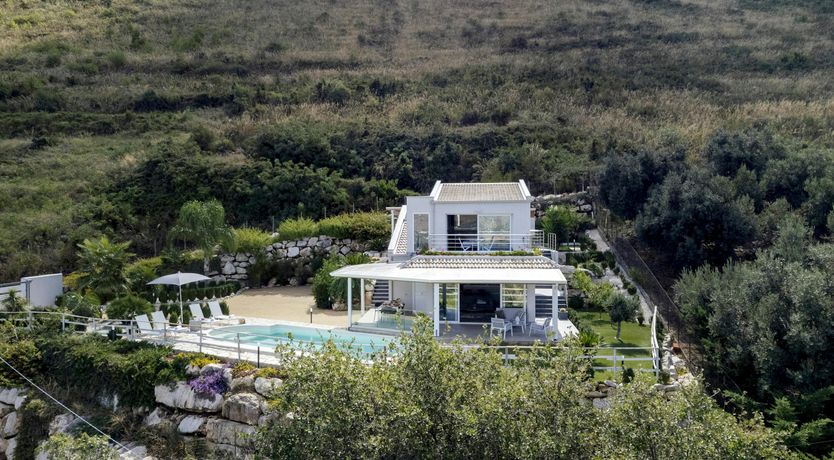 Photo of Serene Sea & Mountain Vistas