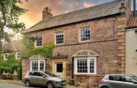 Photo of low-green-cottage