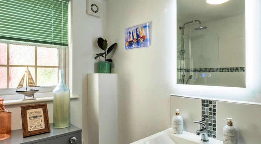 Photo of Nicely Tucked Away Cottage