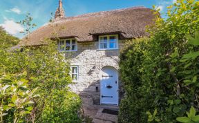 Photo of Thatched Charm