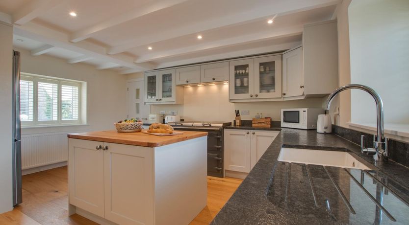 Photo of 4 Bed in West Down